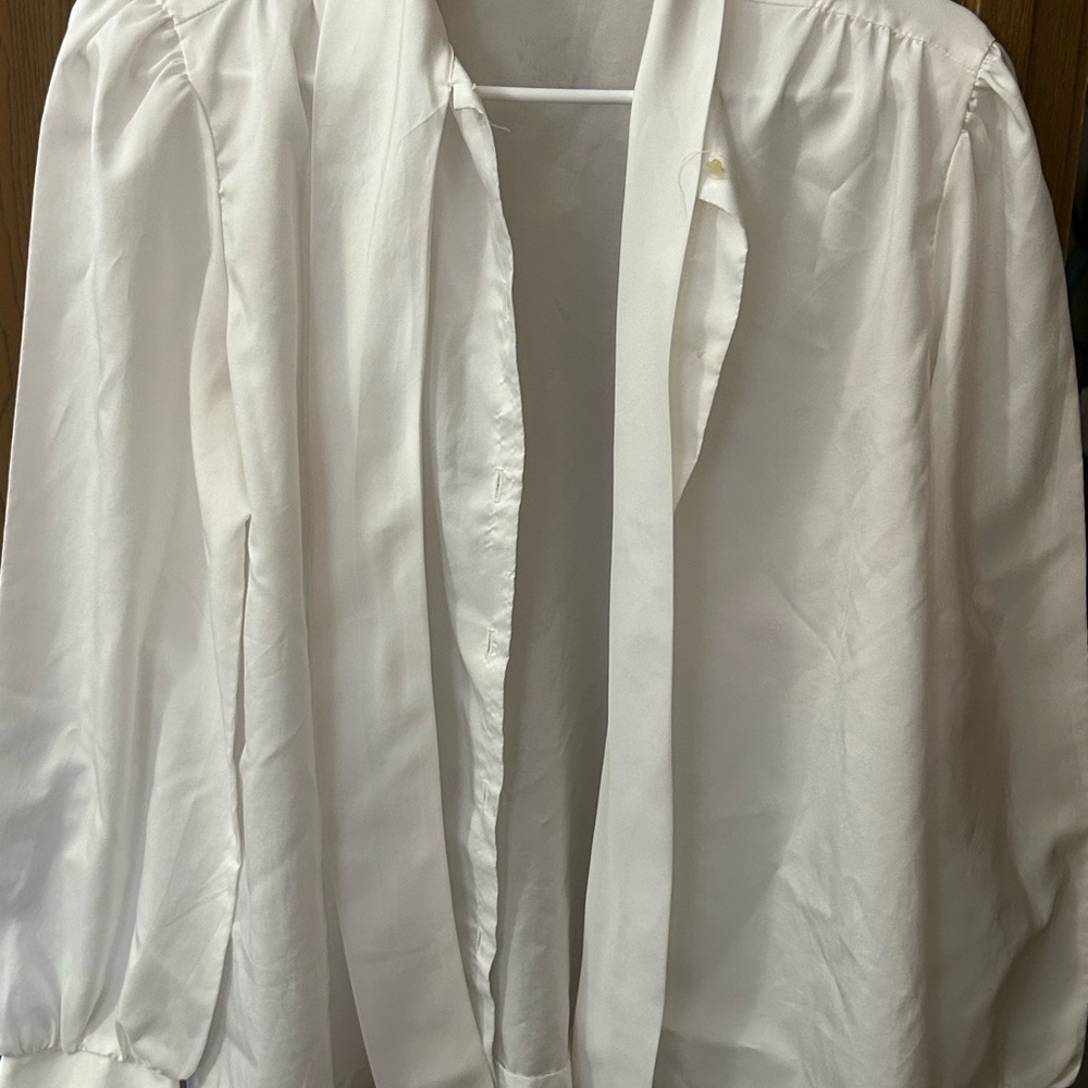Women’s vintage blouse. White with long sleeves. Never worn.